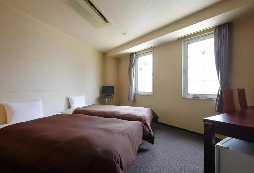 Отель Grampus Inn Osaka