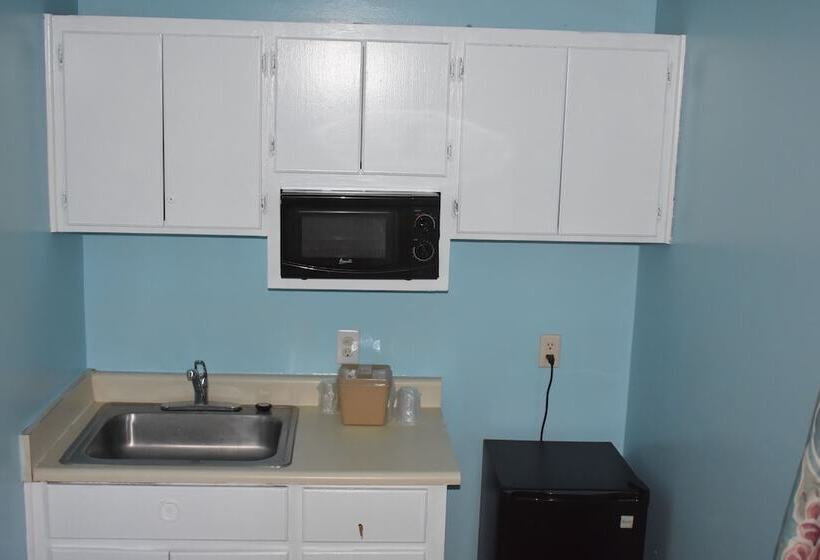 Отель Guest Cottages & Suites