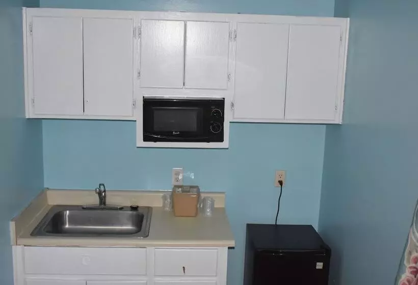 Отель Guest Cottages & Suites