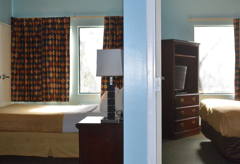 Отель Guest Cottages & Suites