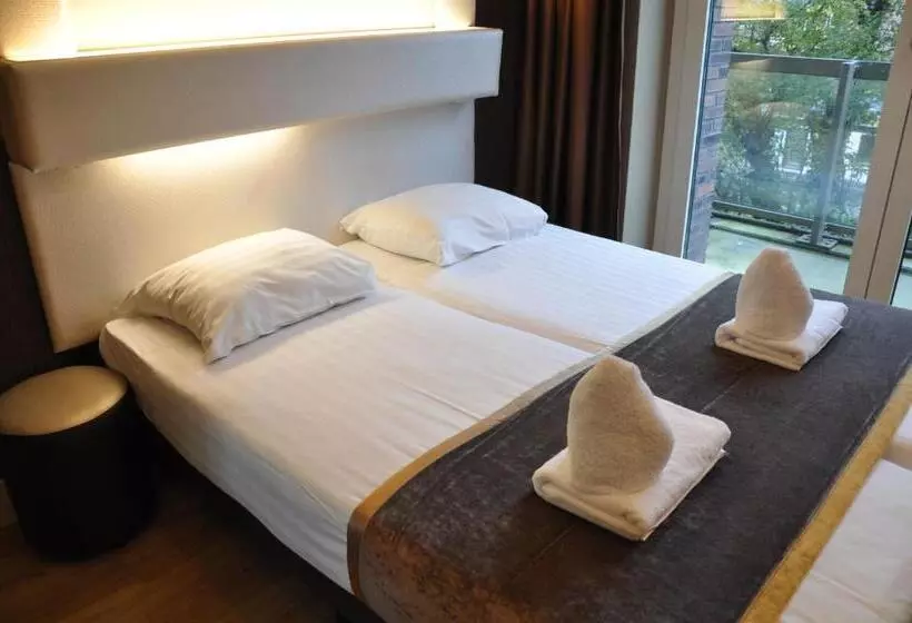 בית מלון כפרי Mosaic City Centre