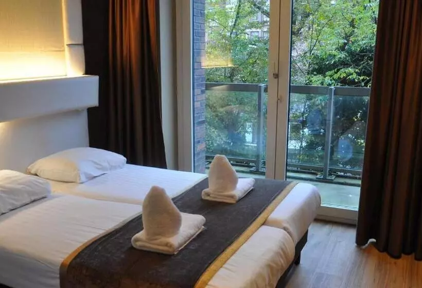 בית מלון כפרי Mosaic City Centre