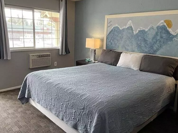 Motel Bluebird Day Inn & Suites