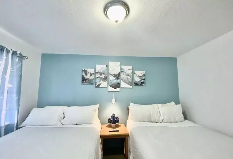 Motel Bluebird Day Inn & Suites