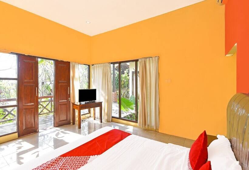 Отель Oyo 91191 Lovina Dolphin Lodge