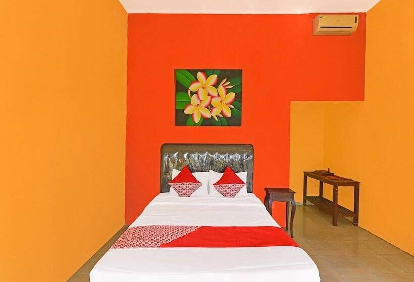 Отель Oyo 91191 Lovina Dolphin Lodge