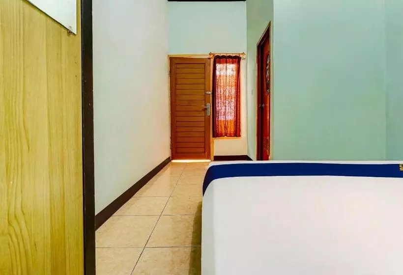 Hotelli Spot On 91159 Kost Putrana Syariah