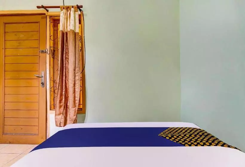 Hotelli Spot On 91159 Kost Putrana Syariah