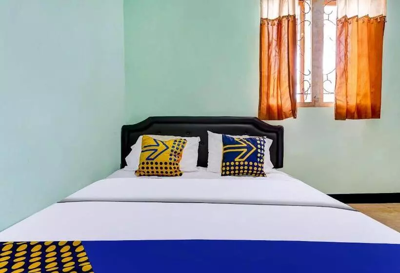 Hotelli Spot On 91159 Kost Putrana Syariah