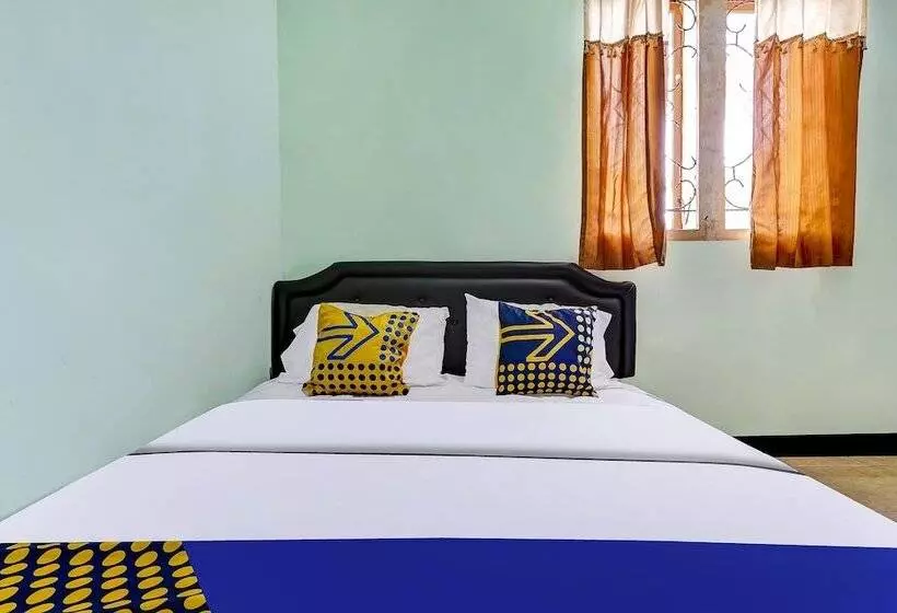 Hotelli Spot On 91159 Kost Putrana Syariah