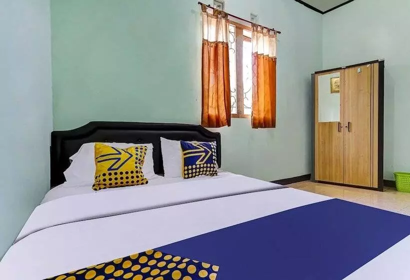 Hotelli Spot On 91159 Kost Putrana Syariah