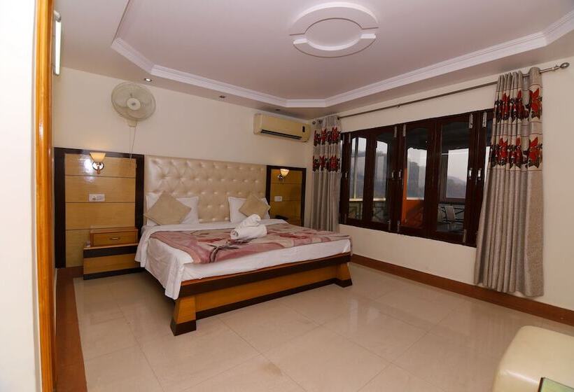 בית מלון כפרי Ganesha Inn Ganga View