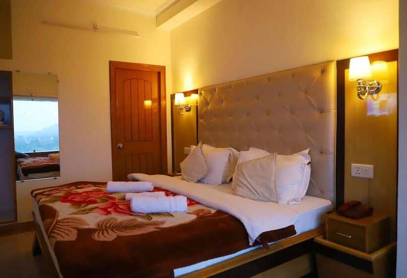 בית מלון כפרי Ganesha Inn Ganga View