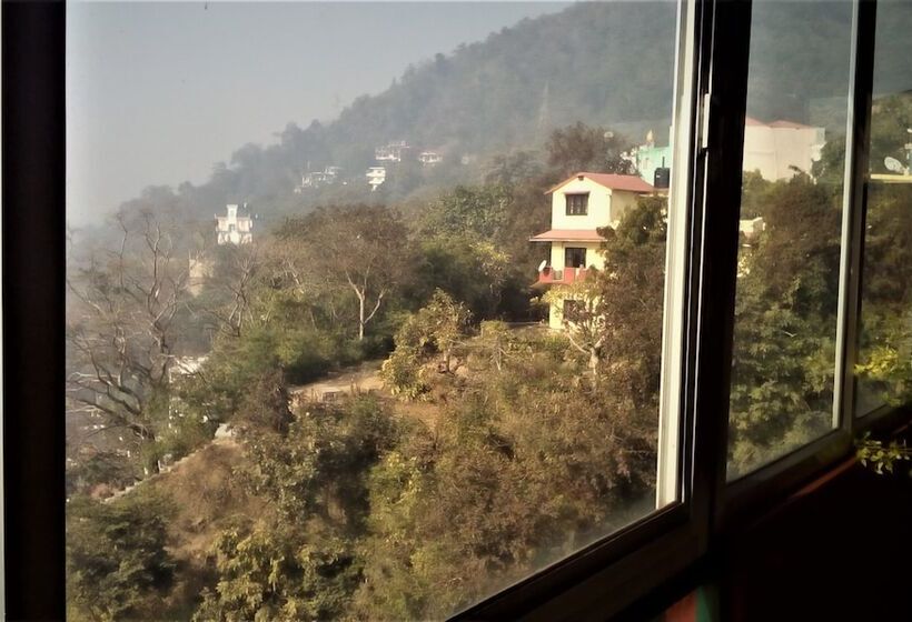 בית מלון כפרי Ganesha Inn Ganga View