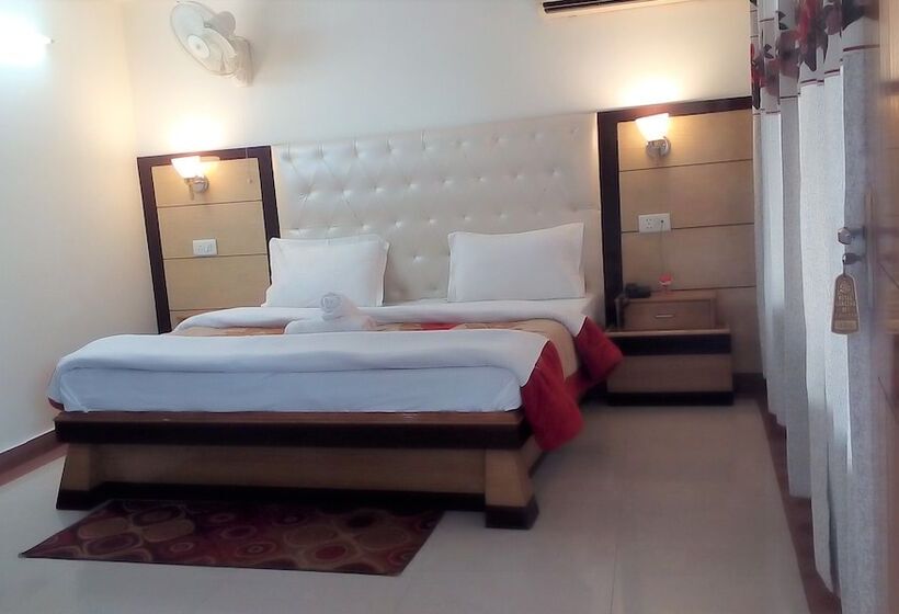 בית מלון כפרי Ganesha Inn Ganga View