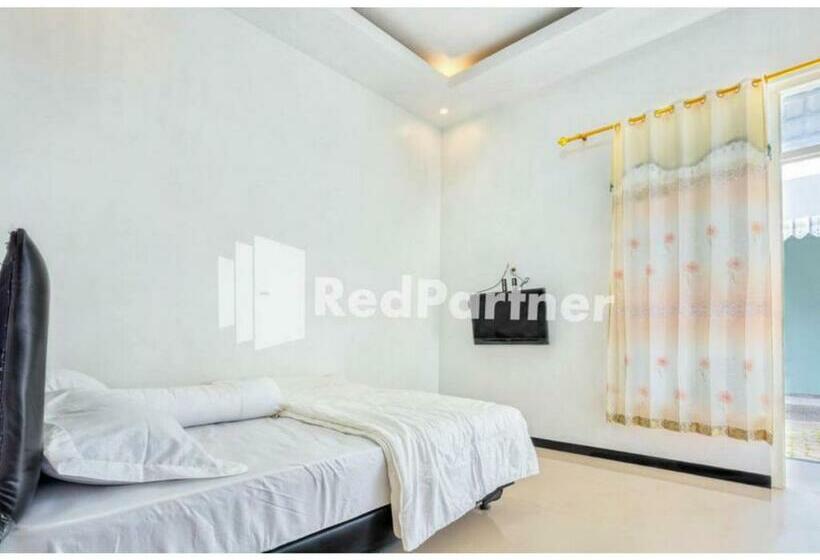 호텔 Griya Rahayu Guesthouse Mitra Reddoorz Near Jatim Park 2 Batu