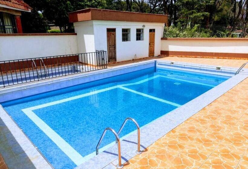 هتل Mani S Home Away From Home