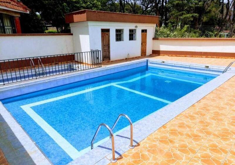 هتل Mani S Home Away From Home