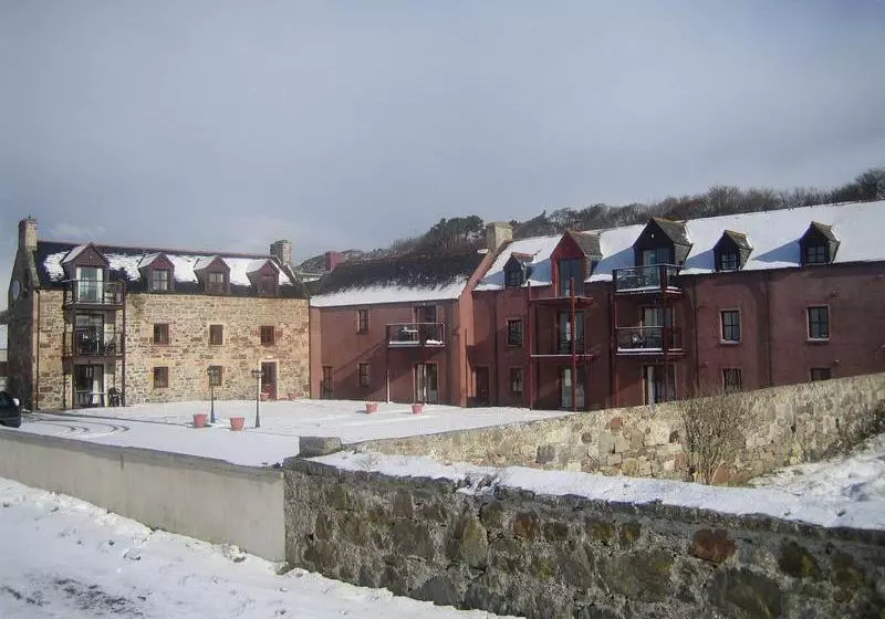 Отель Dolphin Bay Suites