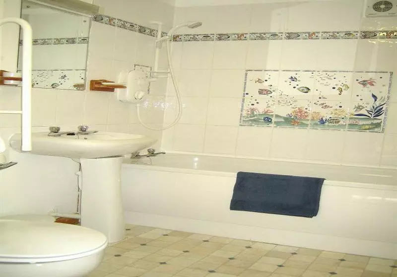 Отель Dolphin Bay Suites