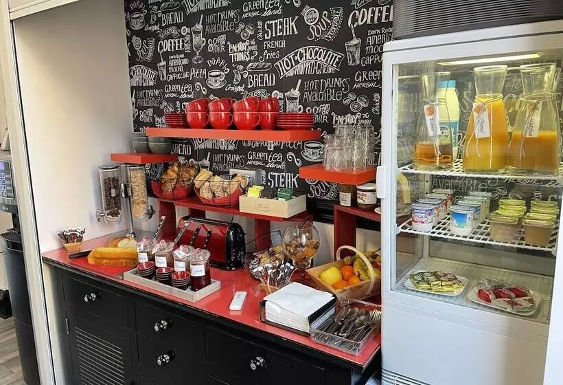 هتل Au Chapon Fin