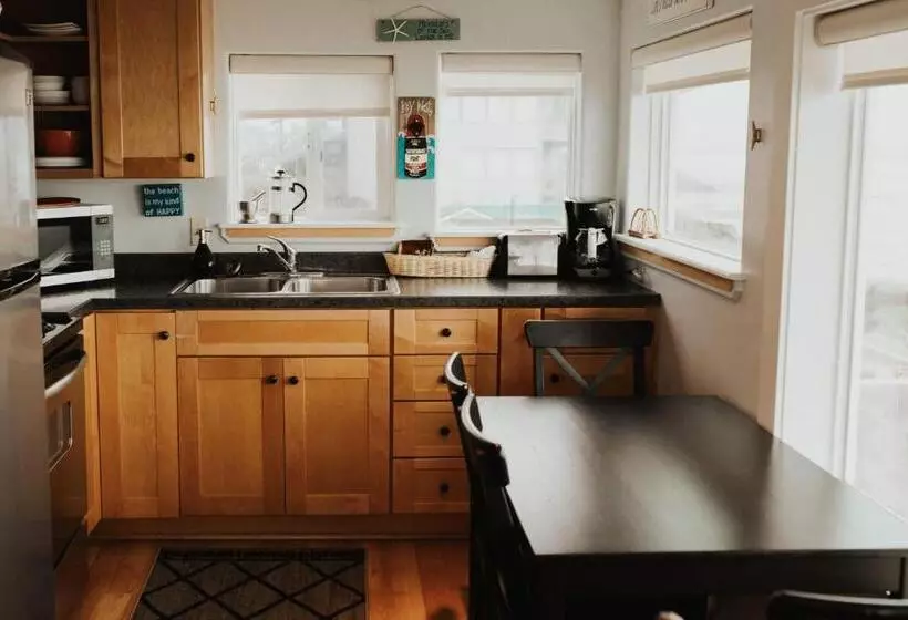 فندق Nye Beach Cottages