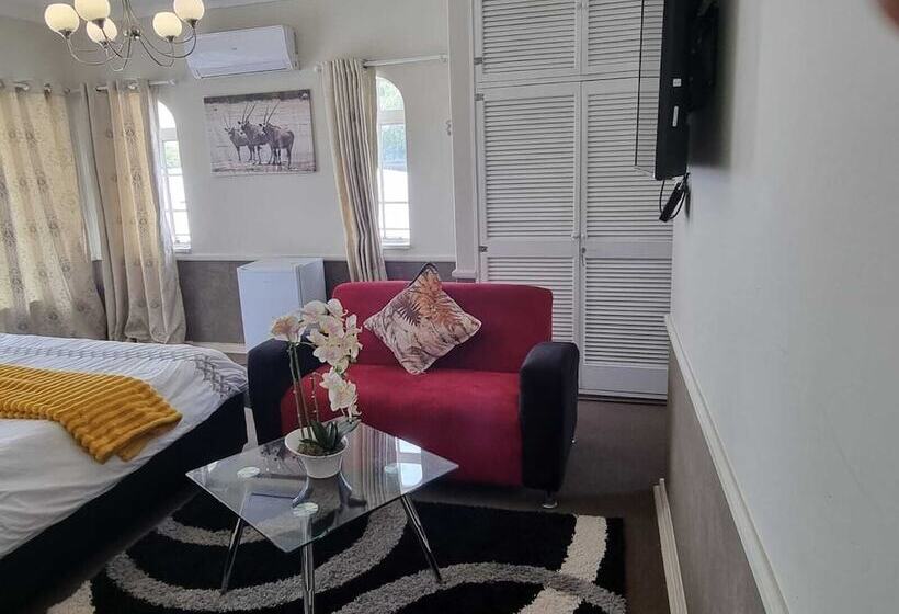 Отель Alicats Place Executive Lodge & Conference