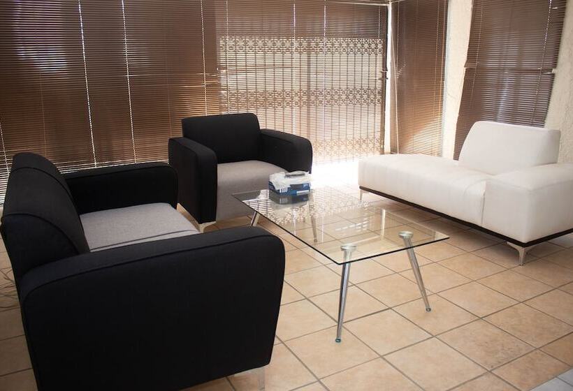 Отель Alicats Place Executive Lodge & Conference