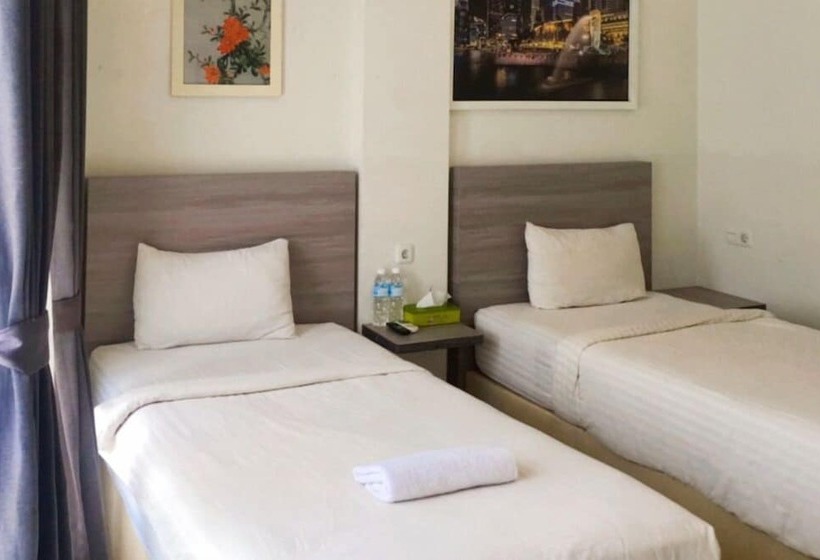 هتل Twospaces Living At Maximus Inn