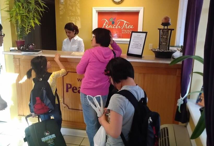 فندق على الطريق Peach Tree Inn