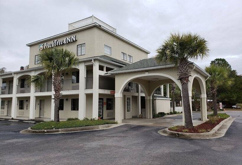 فندق على الطريق Peach Tree Inn