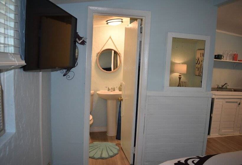 בית מלון כפרי Neptune S Grotto Waterfront Retreat