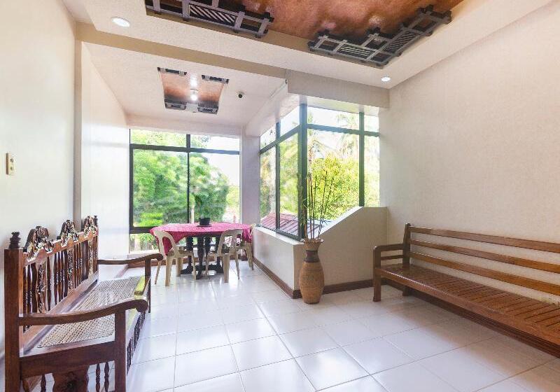 בית מלון כפרי Reddoorz At Coco Grove Tourist Inn