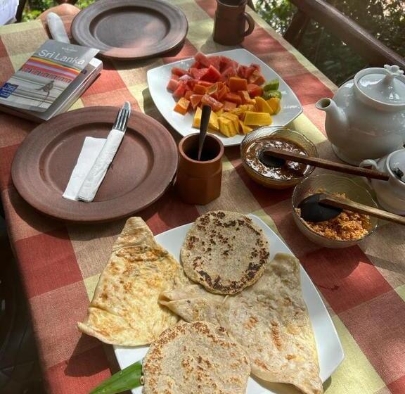 تختخواب و صبحانه The Nirwana Cottage