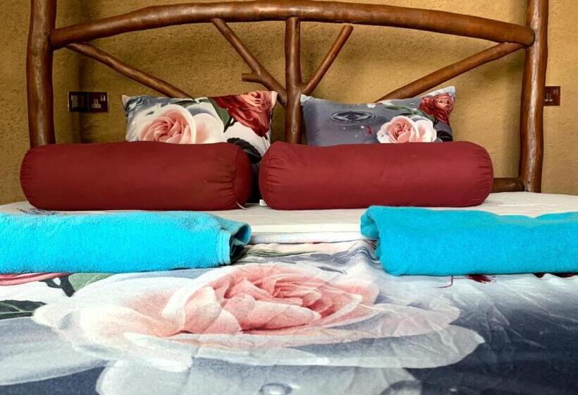 تختخواب و صبحانه The Nirwana Cottage