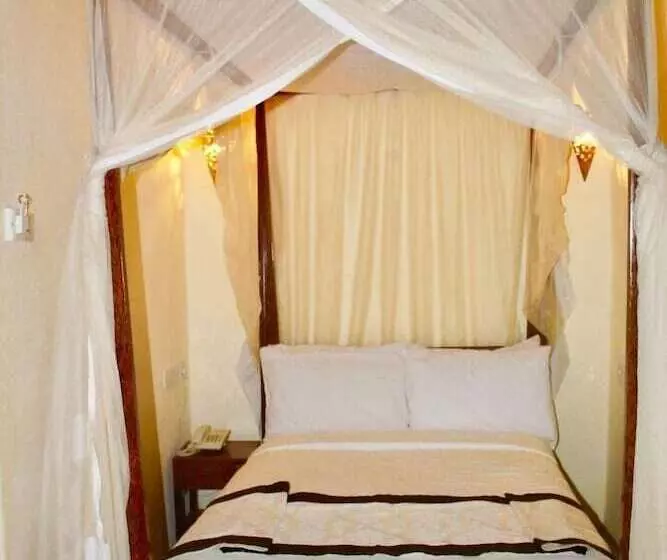 تختخواب و صبحانه The Island Stone Town