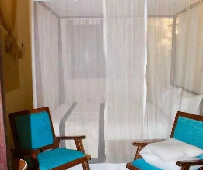 تختخواب و صبحانه The Island Stone Town