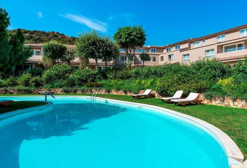 Отель Chia Laguna Resort - Spazio Oasi