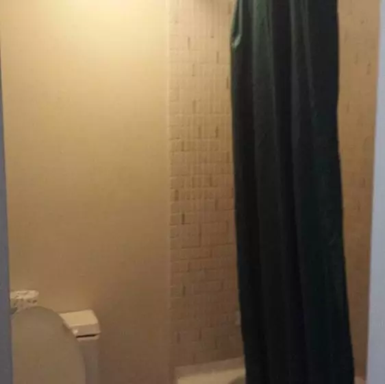 모텔 Airport Motor Inn Lounge/package Store