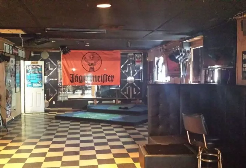 모텔 Airport Motor Inn Lounge/package Store