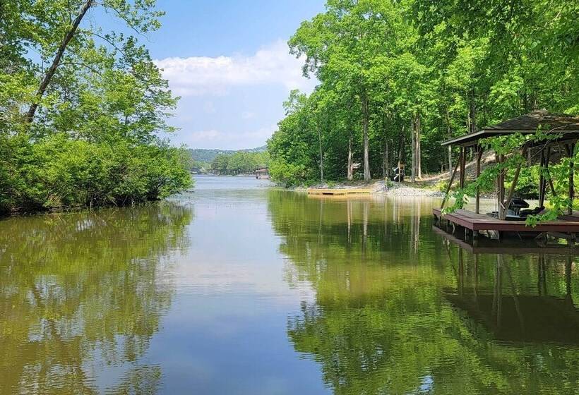 Kayaks & Boat Dock: Lakeside Hot Springs Retreat