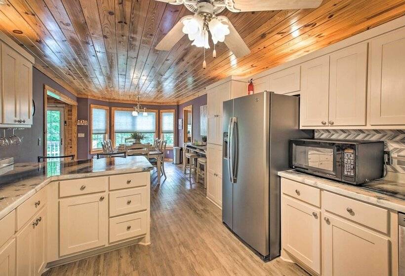 Kayaks & Boat Dock: Lakeside Hot Springs Retreat