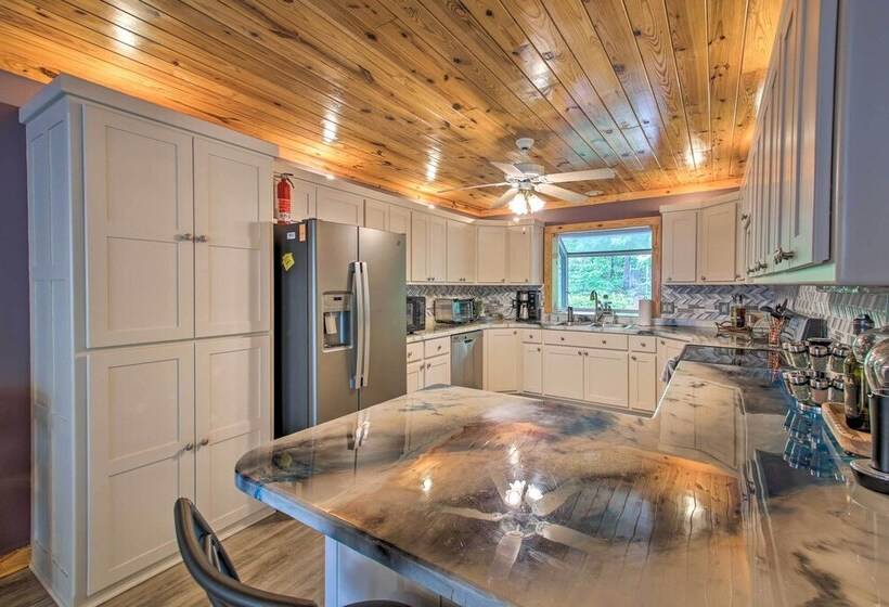 Kayaks & Boat Dock: Lakeside Hot Springs Retreat