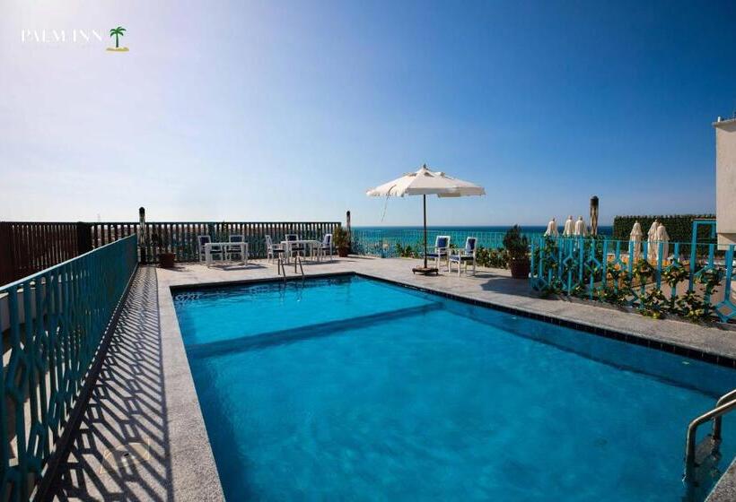 هتل Palm Inn Suites