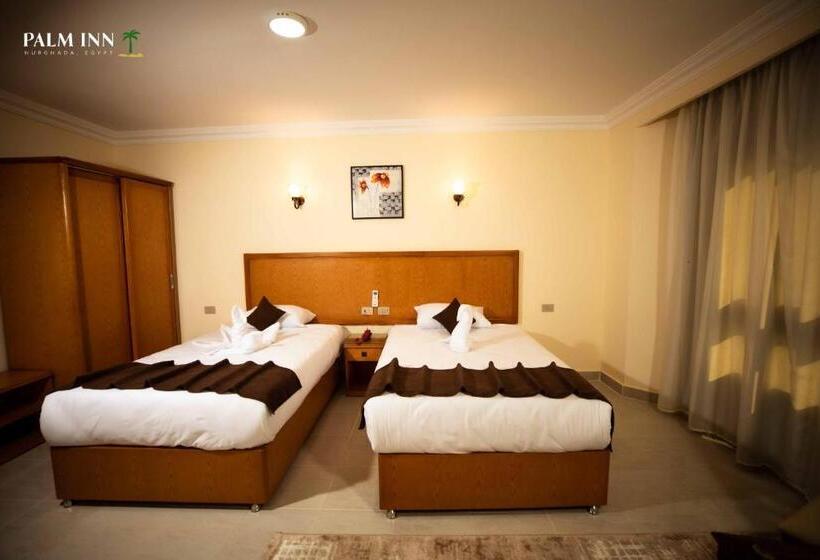 هتل Palm Inn Suites