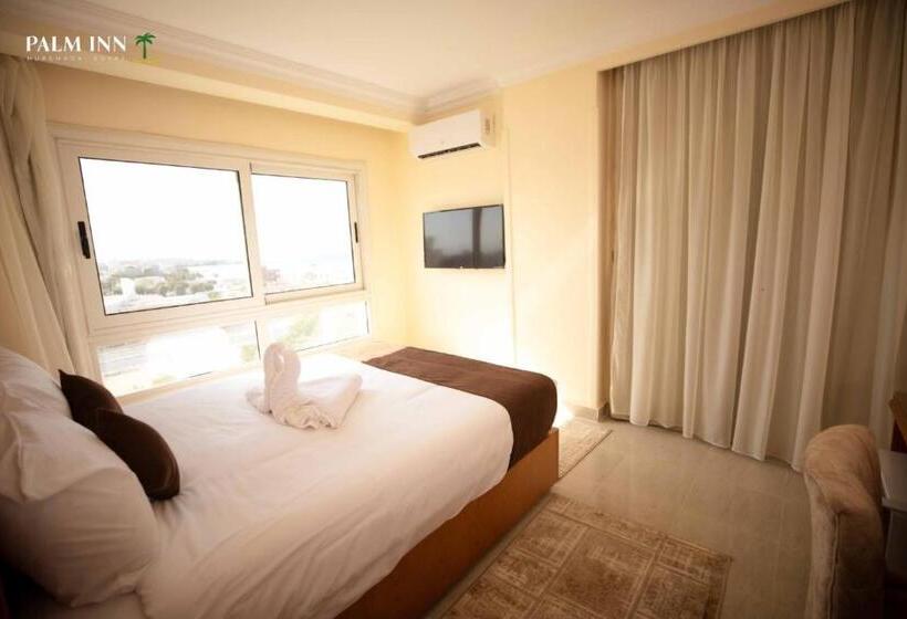 هتل Palm Inn Suites