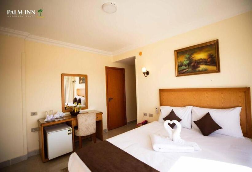 هتل Palm Inn Suites