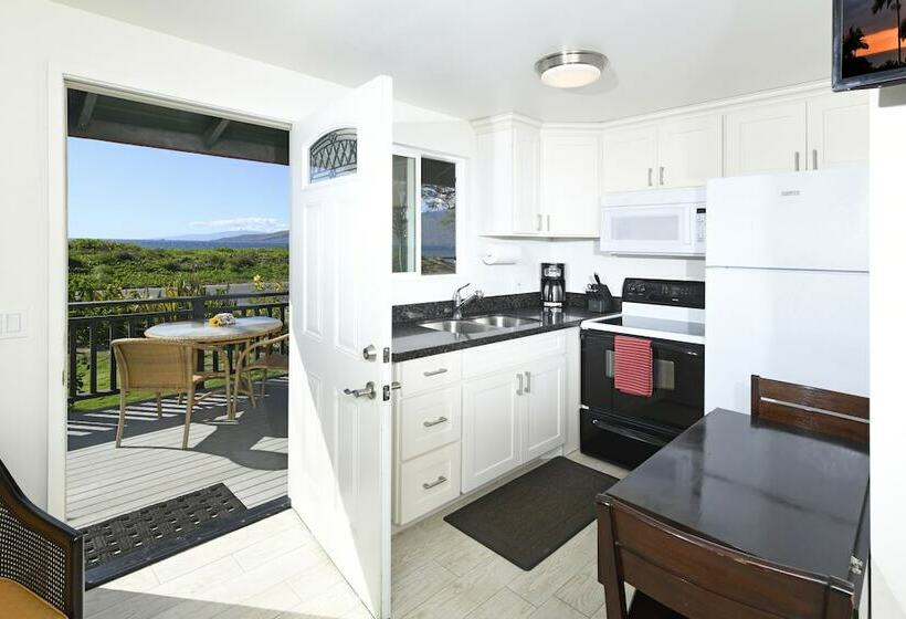 בית מלון כפרי Nona Lani Cottages