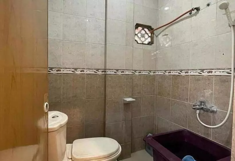 Hotelli Oyo 93502 Homestay Pakmuklis Syariah 2