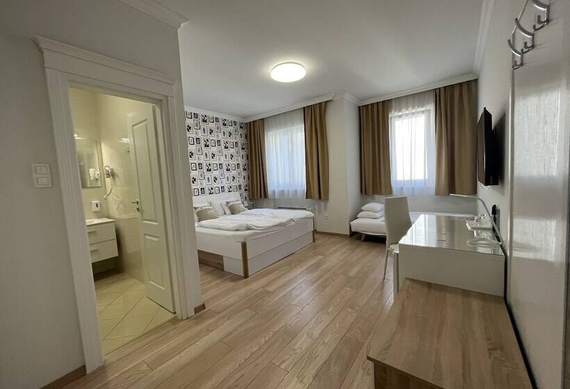 Отель Camille Apartments